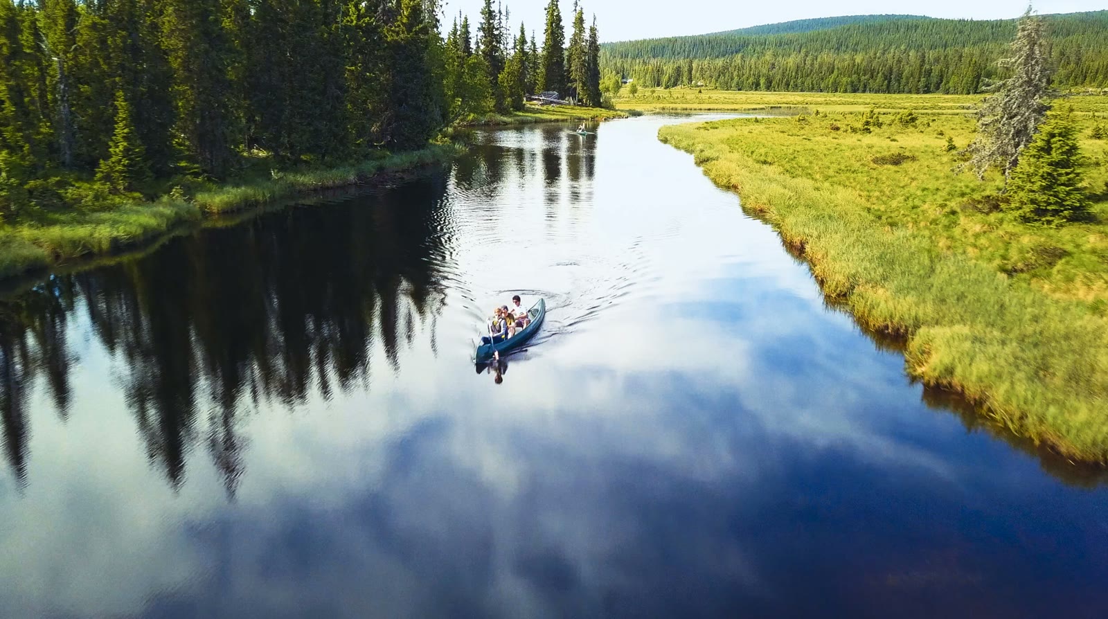 The river Åsta mirror-calm from above