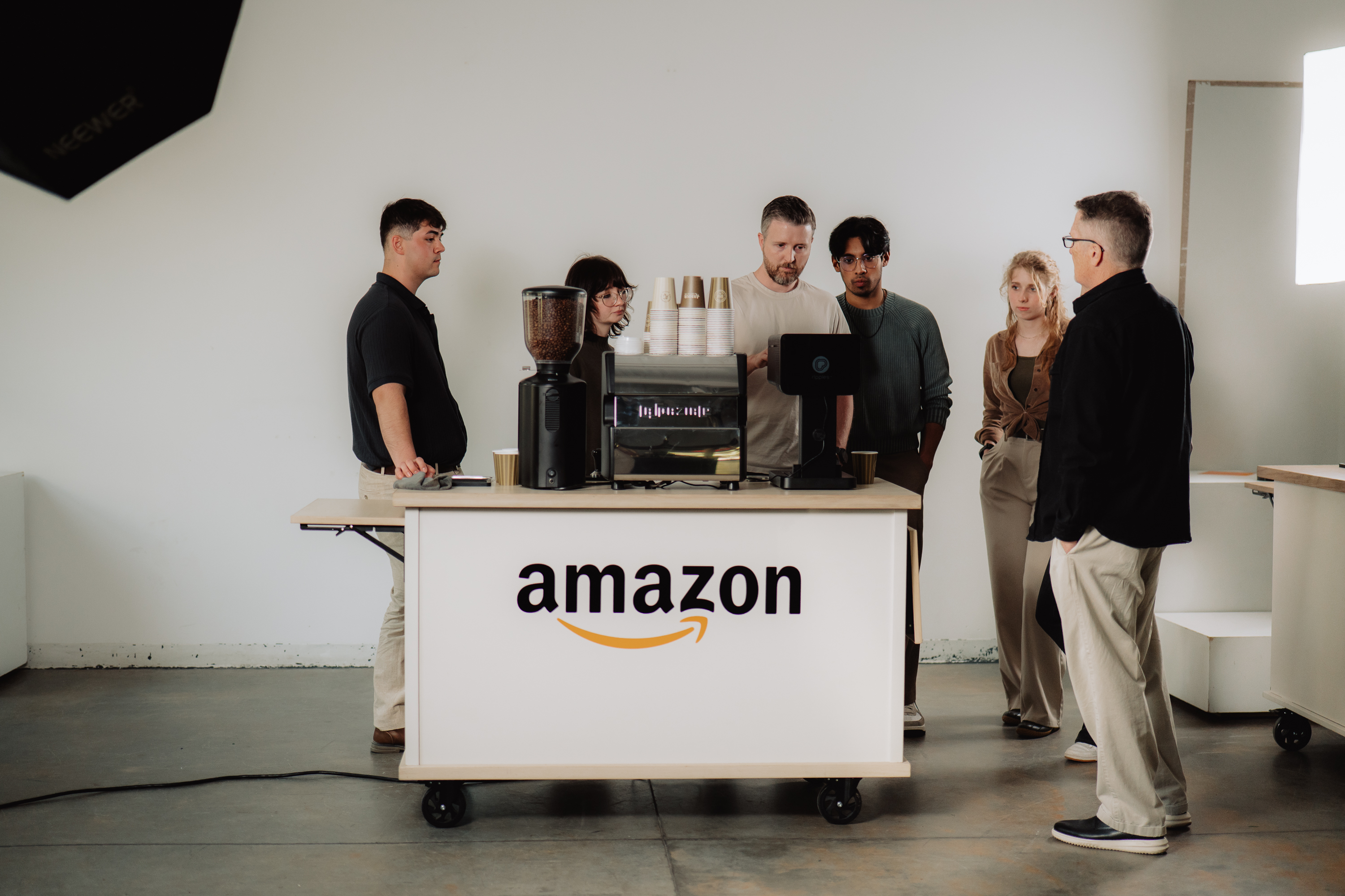 Coffee cart wrapped in a custom branded decal at a corporate event
