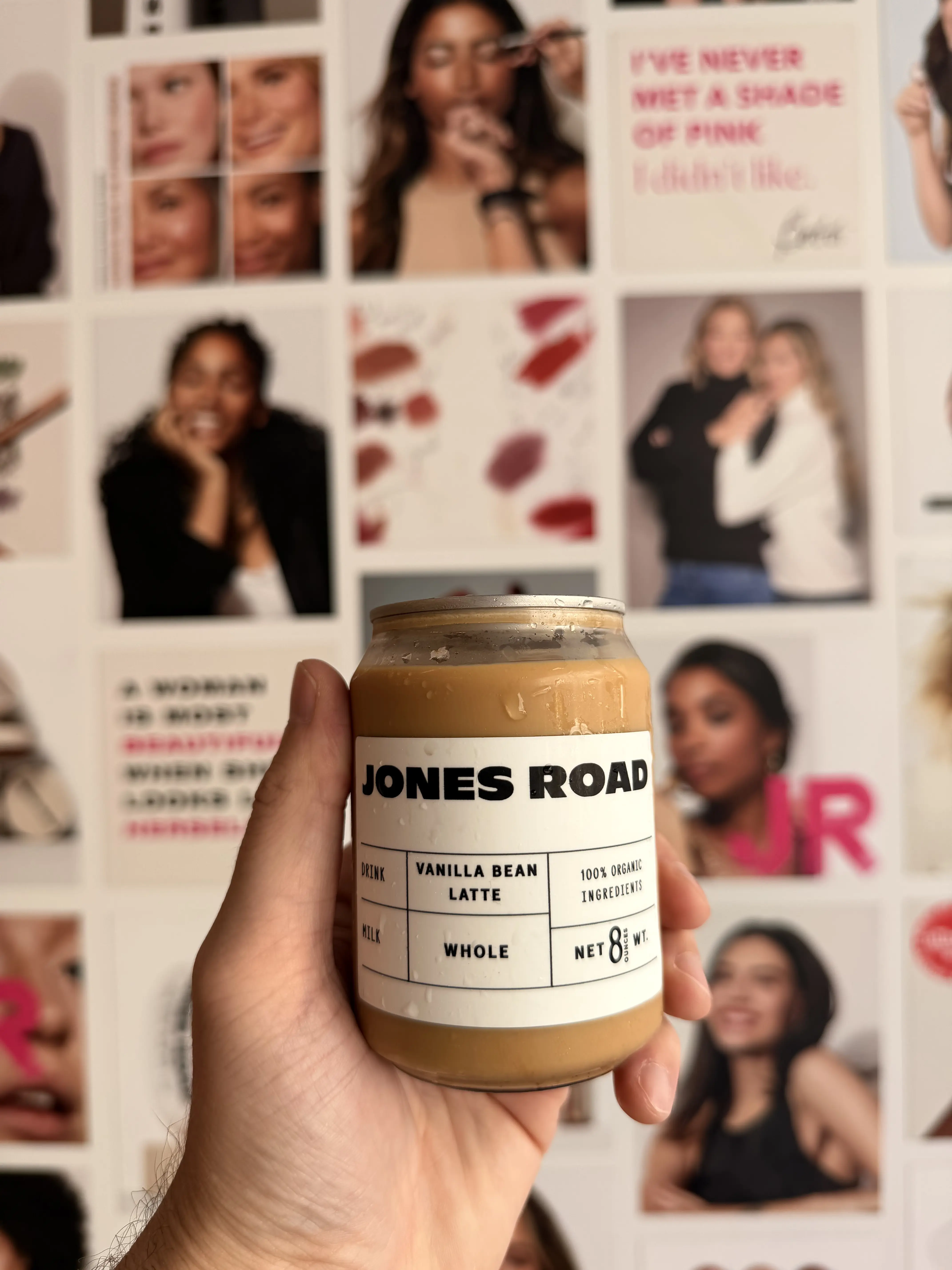 Arbour Coffee Co. canned latte poured over ice in a clear cup