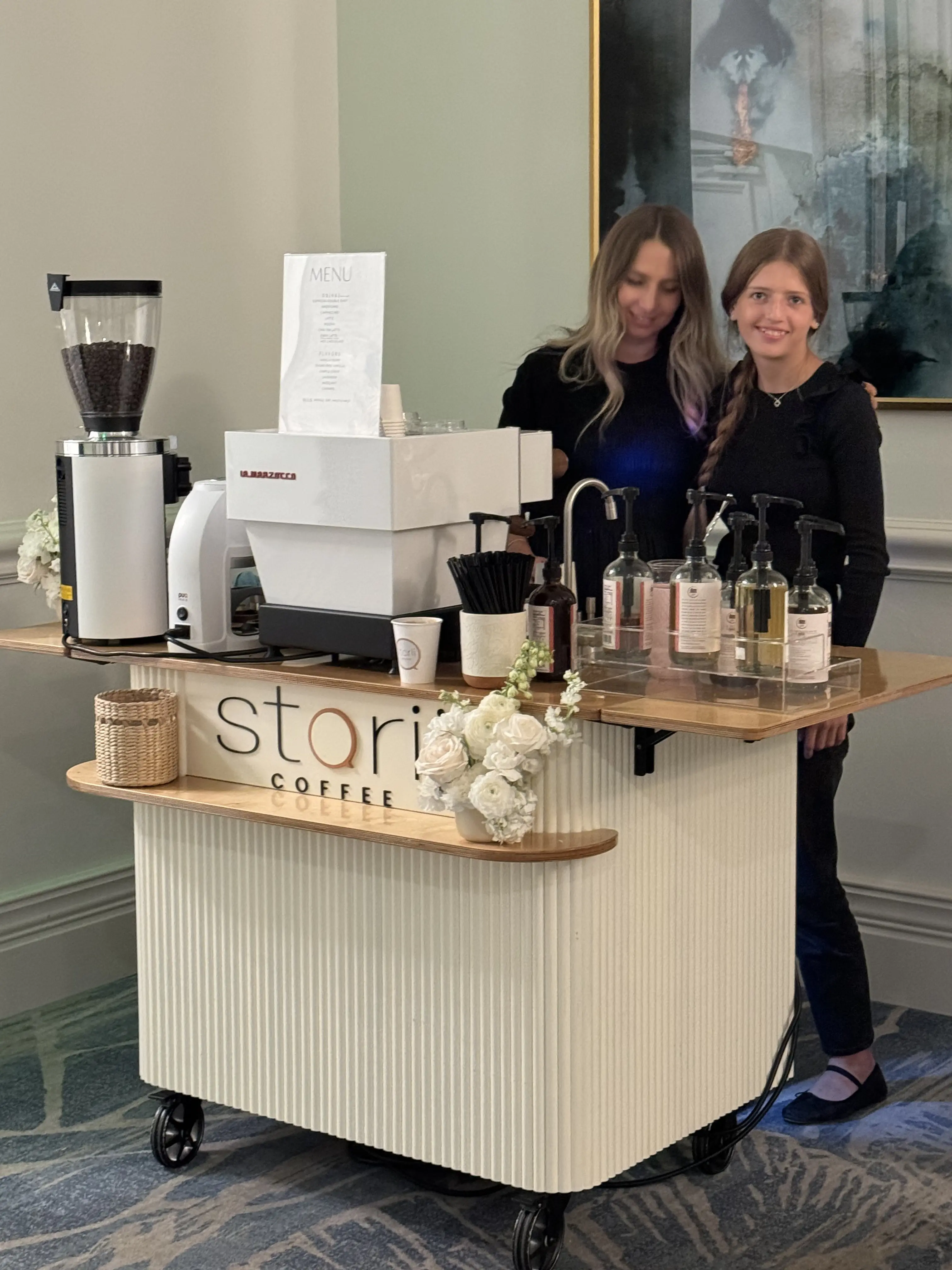 The Storii cart and team set up at an indoor event