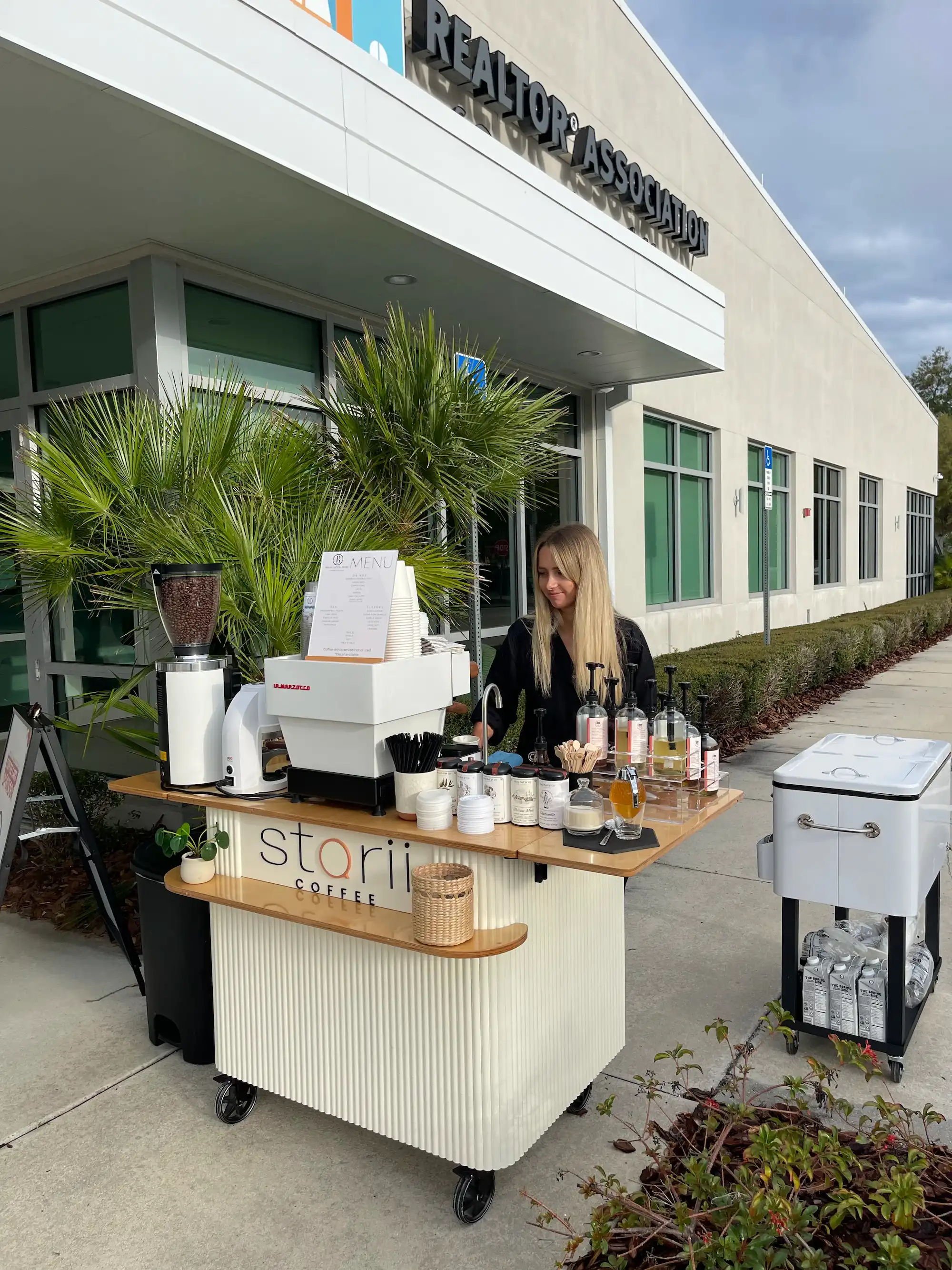 Storii Coffee barista serving a corporate event