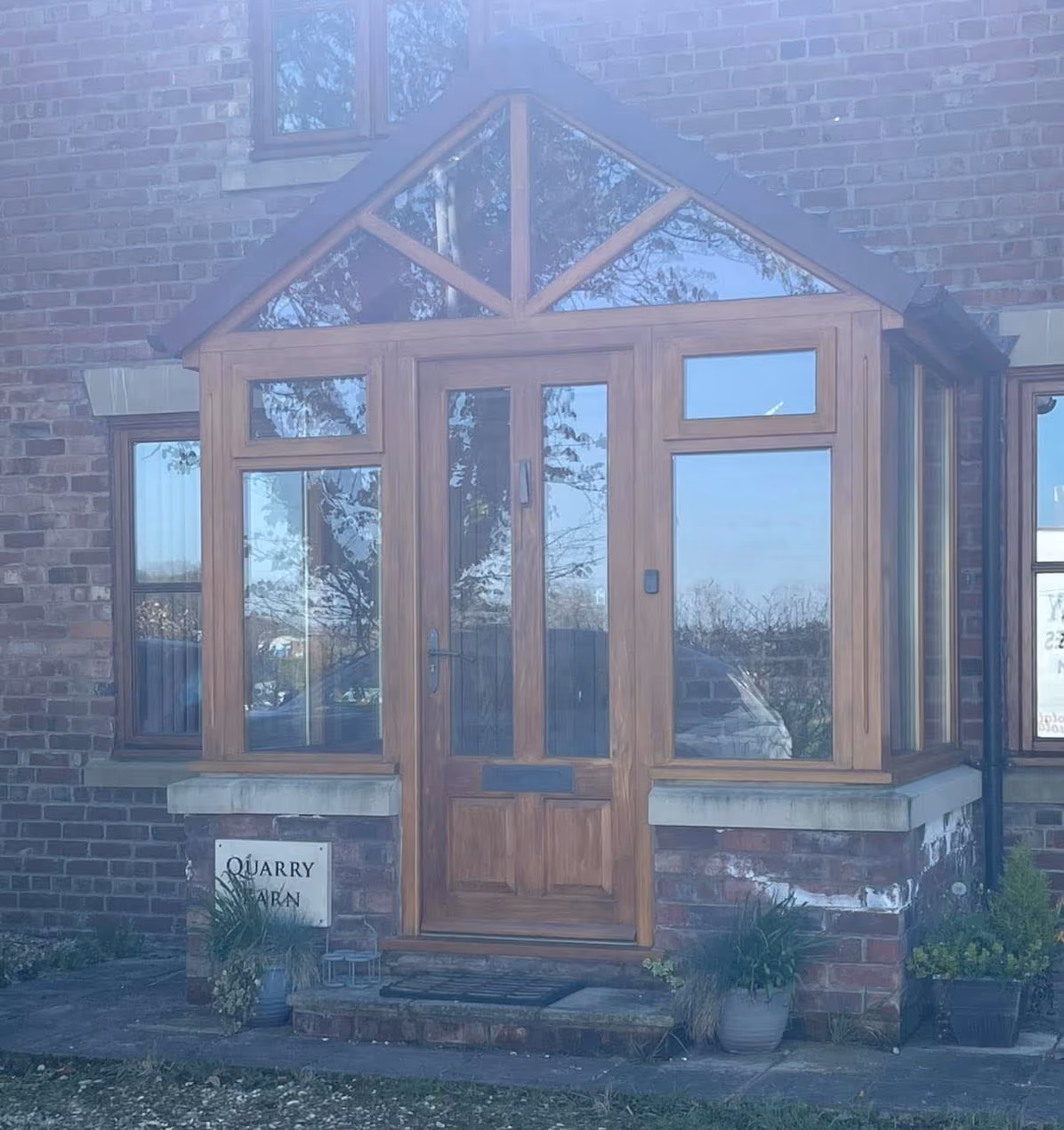 Bespoke glazed hardwood porch with apex roof, made to measure and fitted to a barn conversion near Ormskirk