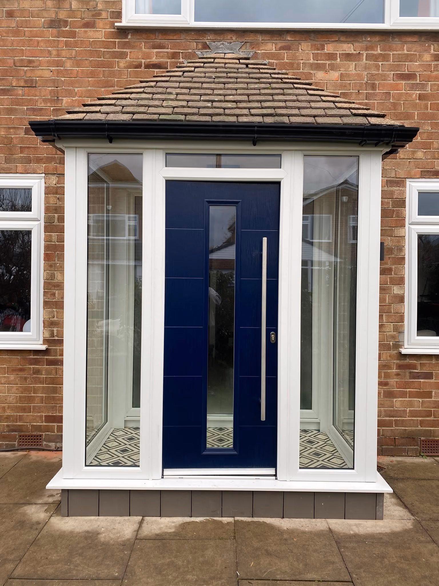 Navy blue composite front door with decorative leaded glass panels fitted in Ormskirk