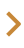 Small orange arrow pointing to the right on a white background.