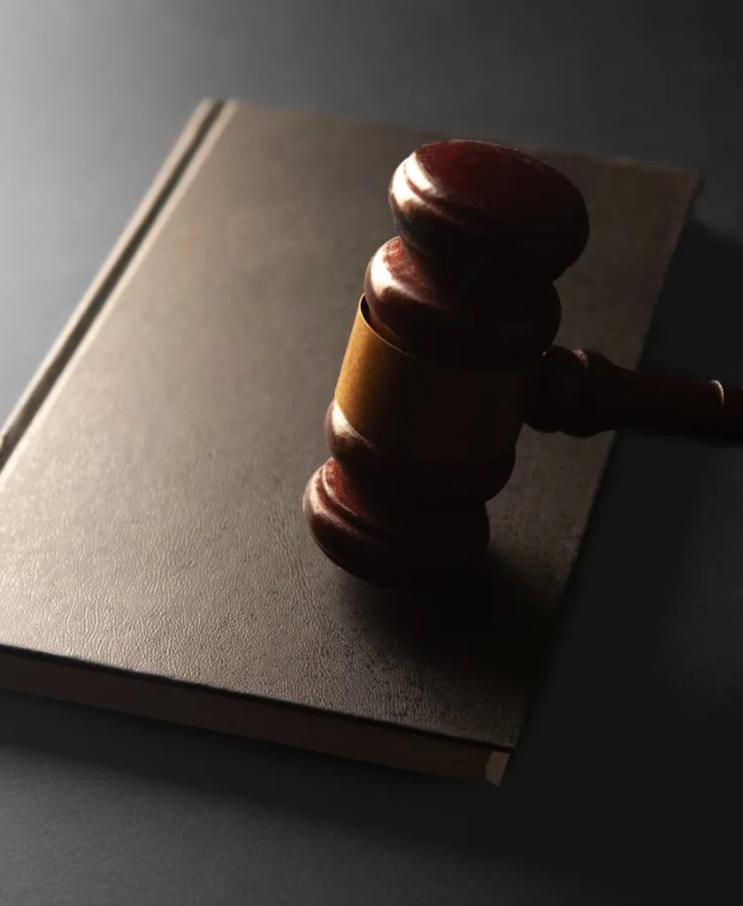 Gavel, scales of justice, and legal documents representing the criminal defense process in Missoula
