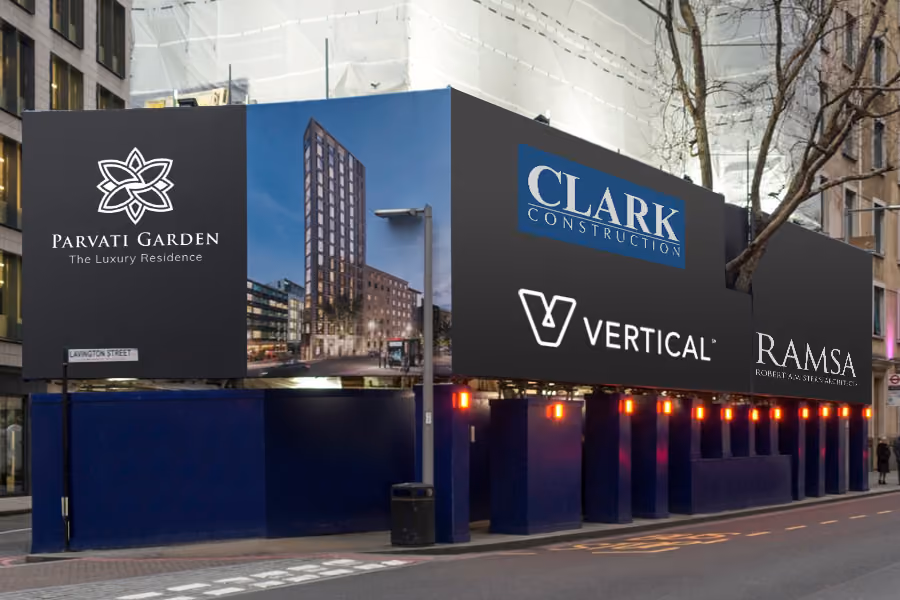 Construction site with banners showing Parvati Garden residence, Clark Construction, Vertical, and RAMSA logos.