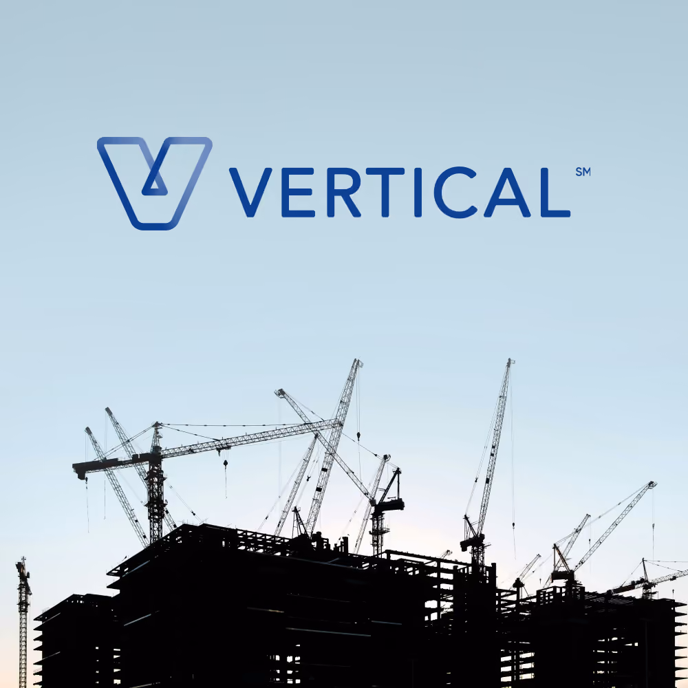 Silhouetted construction cranes and buildings under a clear sky with the Vertical company logo above.