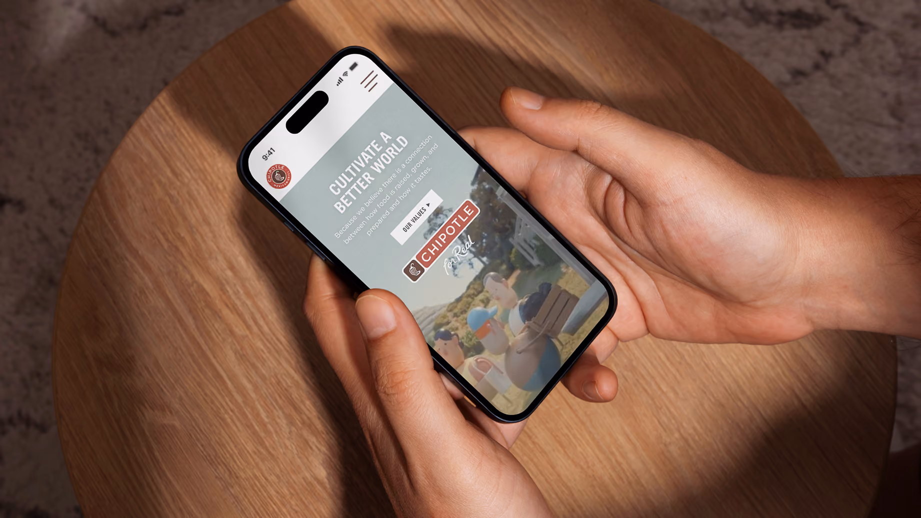 Chipotle website on laptop and phone