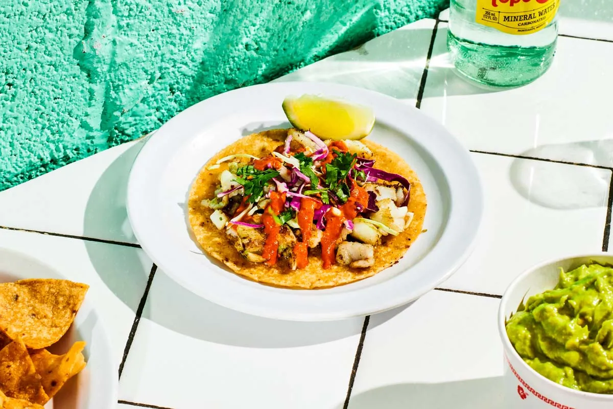 Seared fish taco with cilantro mojo cod and cabbage