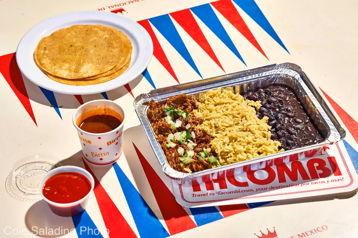 Beef birria plato with braised brisket, consomé, rice and beans