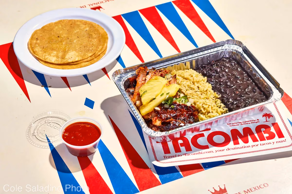 Al pastor plato with roasted pork, pineapple, onions, rice and beans