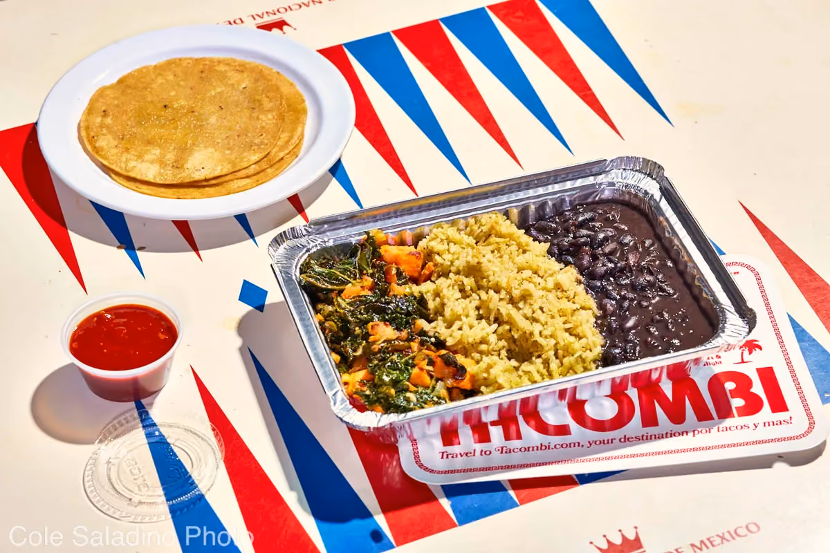 Vegana plato with roasted sweet potato, kale, poblano rajas, rice, beans and tortillas