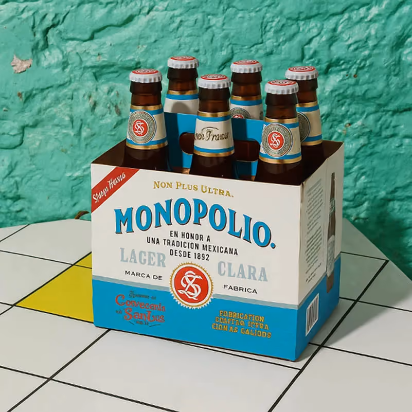 Six-pack of Monopolio Clara lager bottles (cubetazo)