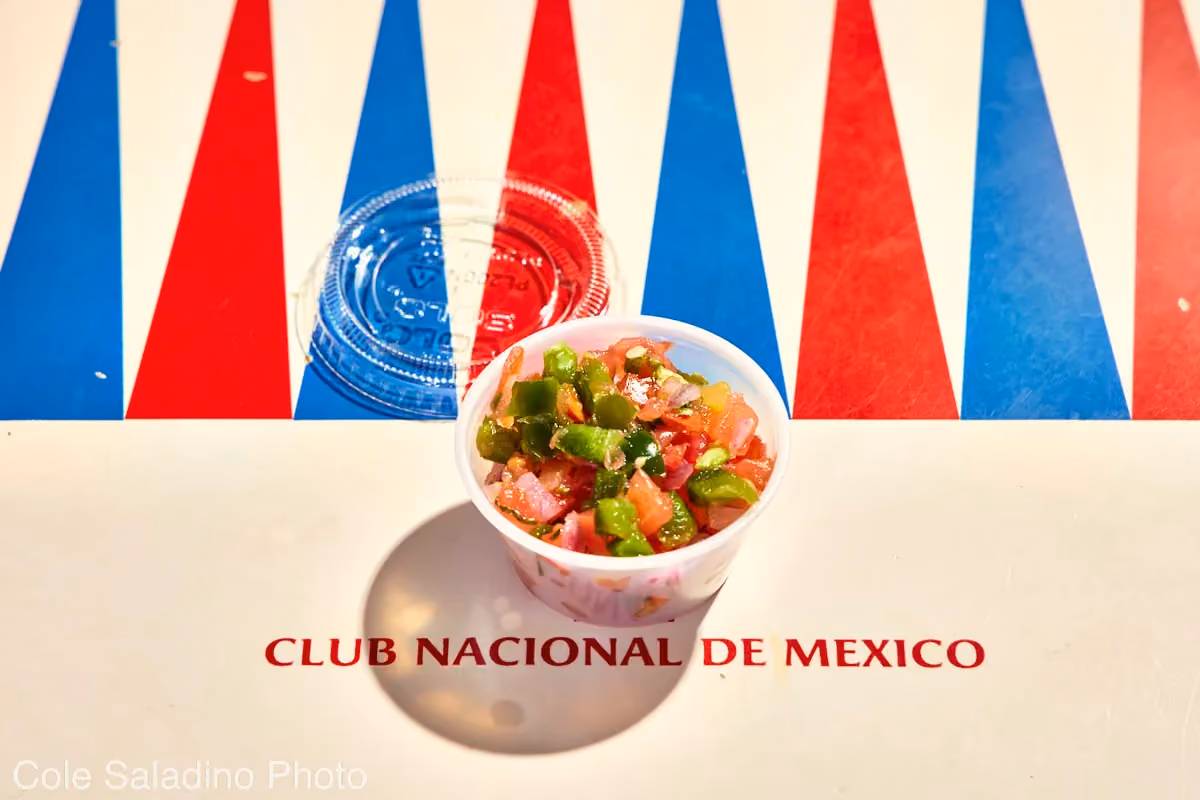 Side of pico de gallo salsa with diced tomatoes, onions, cilantro and serrano chiles