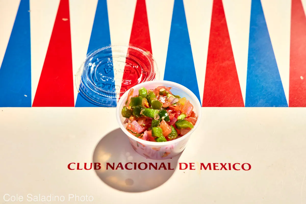 Side of pico de gallo salsa with diced tomatoes, onions, cilantro and serrano chiles