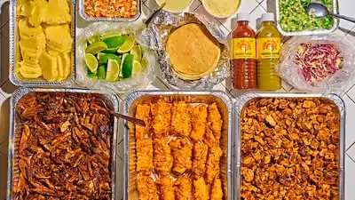 Enjoy a large fleet of flavors, prepared for grande groups. Delight & impress your entire team, family and friends with a mealtime moment they can make their own. Comes with up to three delicious proteins, warm fresh corn tortillas, and your favorite taqueria toppings of pico de gallo, sliced pineapple, poblano mayo, Vista Hermosa roasted tomato salsa and green salsa, queso cotija, cilantro & onion, cabbage, and limes.