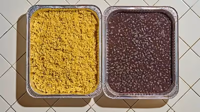 Traditional Mexican arroz verde and with black beans cooked with tomatillo, epazote and poblano pepper. The perfect side dishes for tacos and a convenient choice for the vegetarians in your group