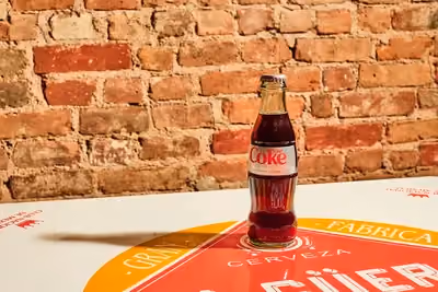 Bottled Diet Coke on a Tacombi table