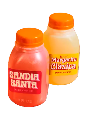 Two bottles of juice, one red and one orange