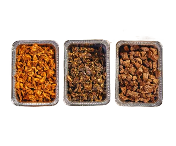 Three small dishes of granola or seasoned nut mix arranged in a row.