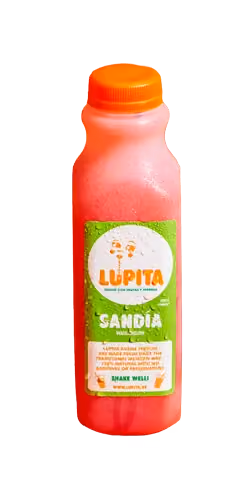 Bottle of orange-red juice with a green label