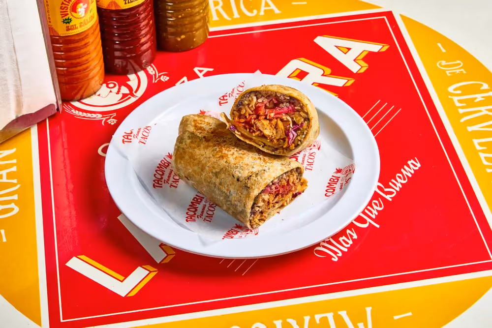 Marinated & roasted free-range chicken in recado rojo. Wrapped in a fresh flour tortilla with homemade black beans, rice and spicy chile salsa