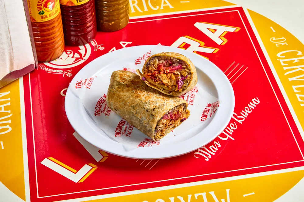 Marinated & roasted free-range chicken in recado rojo. Wrapped in a fresh flour tortilla with homemade black beans, rice and spicy chile salsa