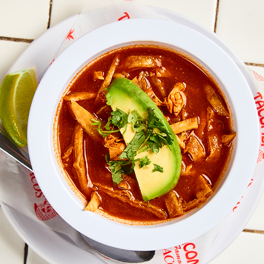 A bowl filled with mexican tortilla soup