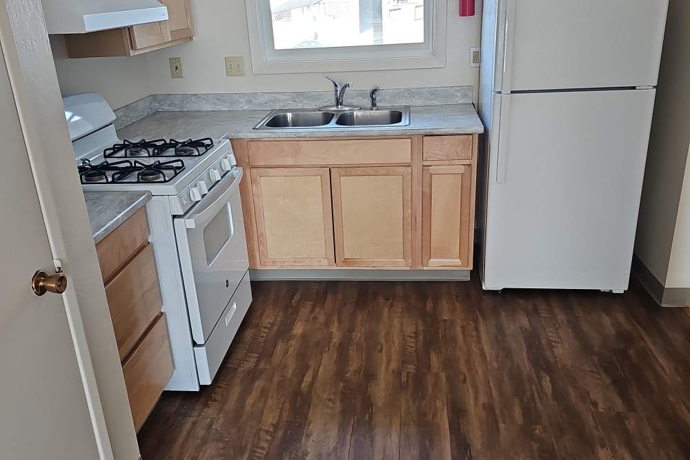 Kitchen with white appliances 