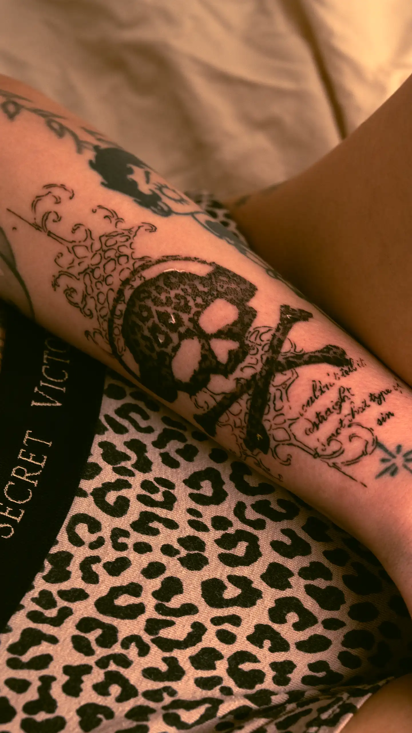 Cheetah-print skull tattoo