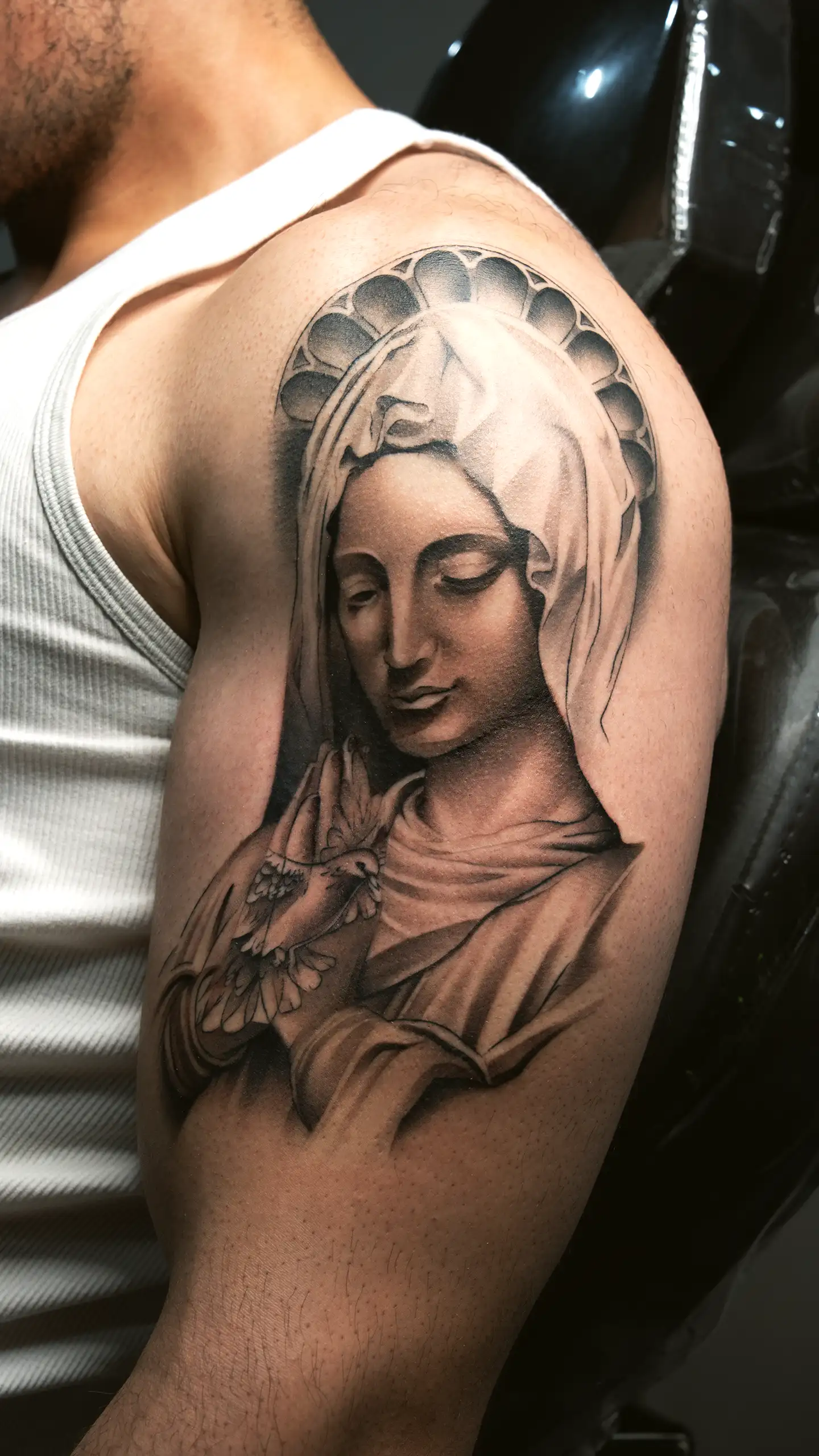 Virgin Mary realism arm tattoo