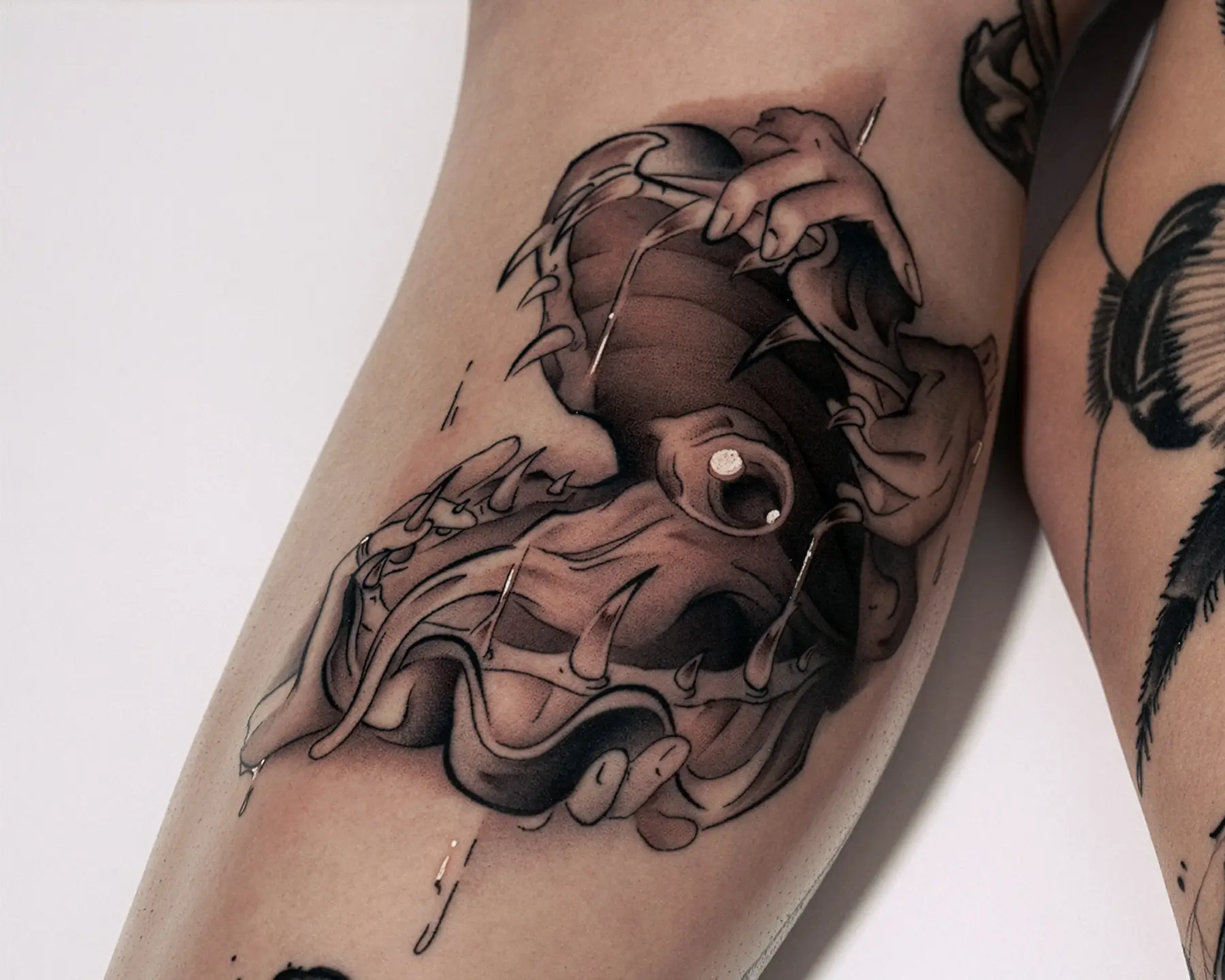 Custom black tattoo for the leg