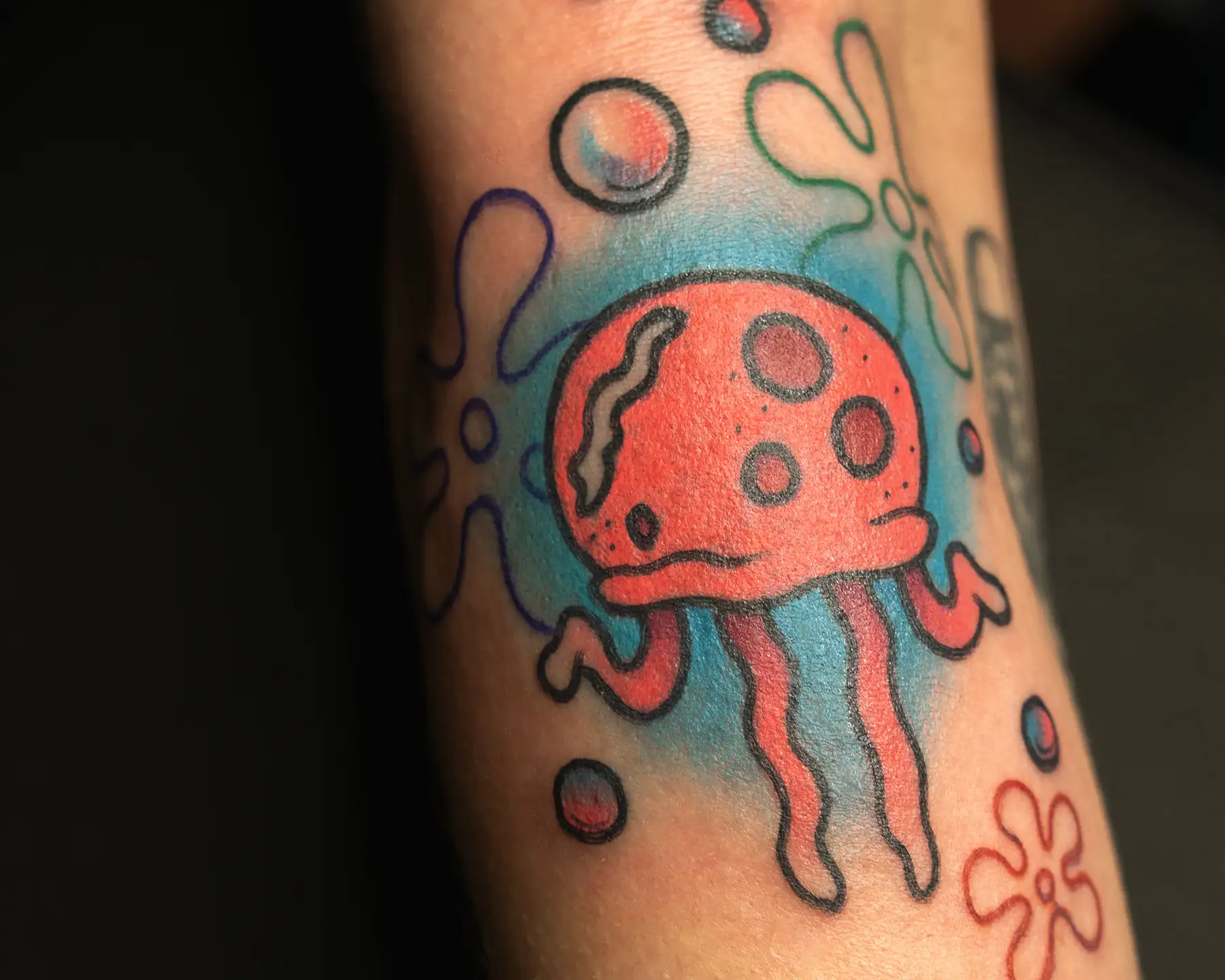 Neo-traditional cartoon tattoo