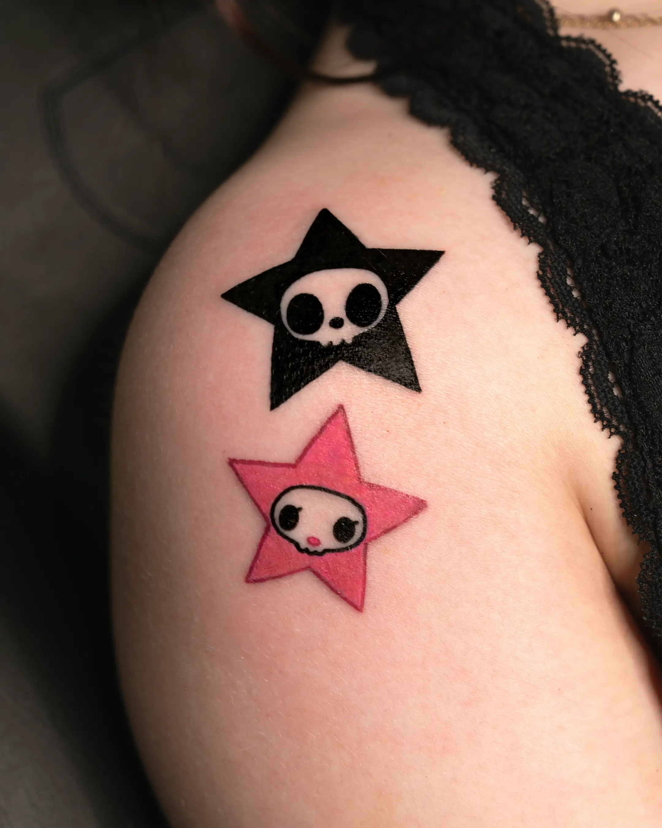 Blackwork stars on the arm