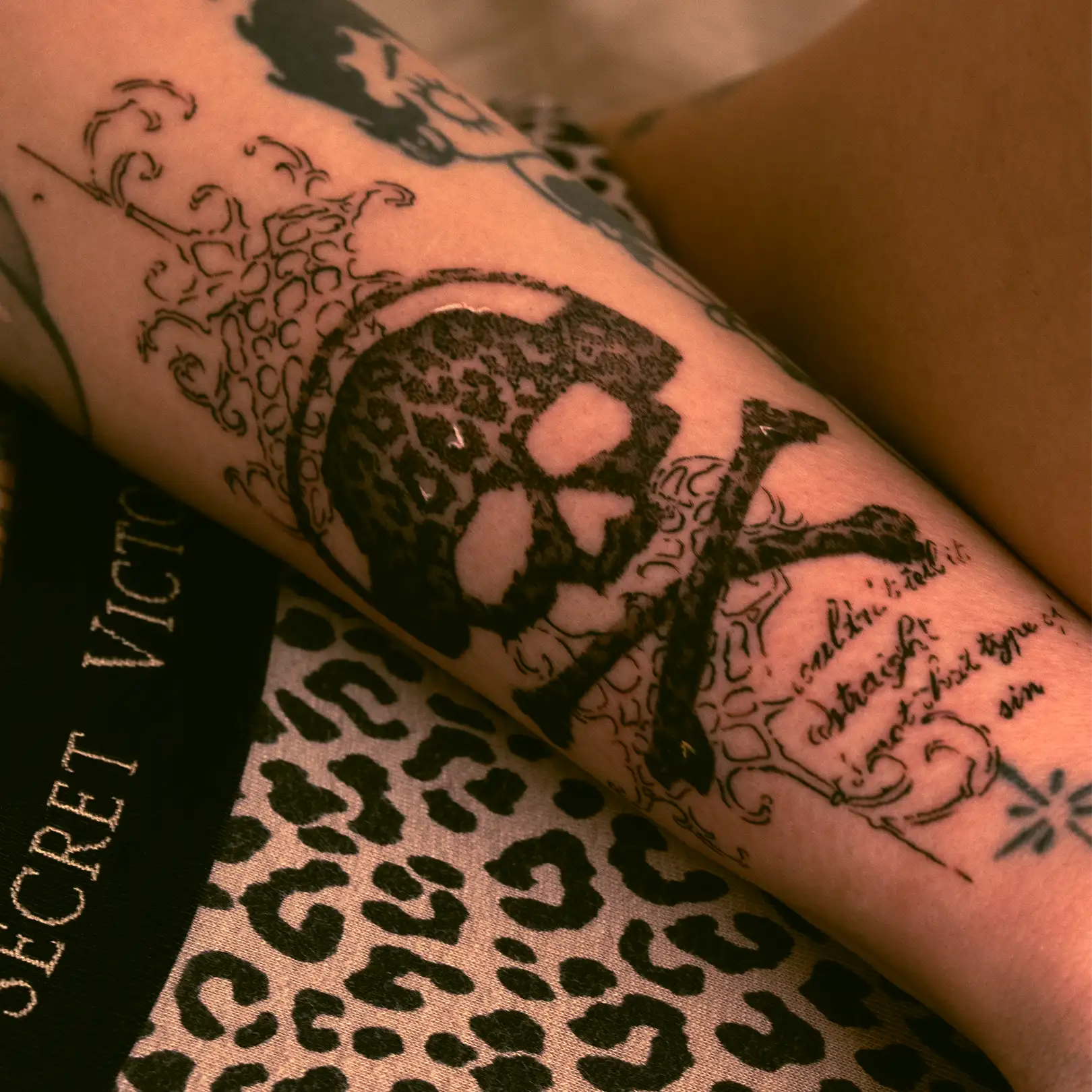 Cheetah-print skull tattoo