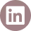 Gray circle with a white icon of a person sitting cross-legged and meditating.