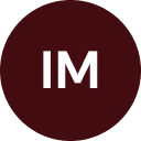 White uppercase letters IM on a maroon circular background.