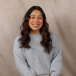 Ms. Samantha Lopez smiling in a professional staff portrait