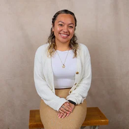 Ms. Lizbeth Eguia smiling in a professional staff photo