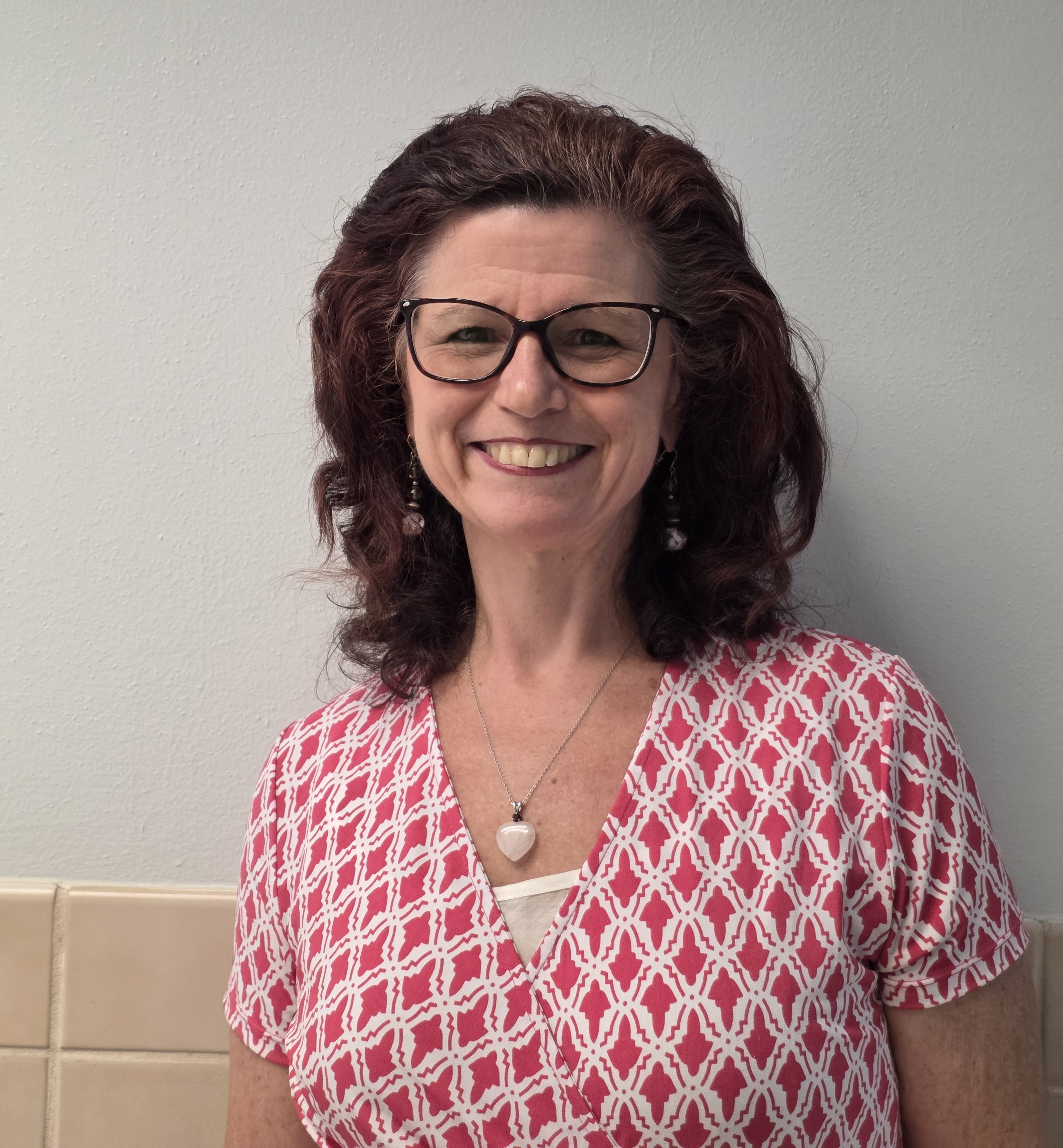Ms. Melissa Humason smiling in staff profile photo