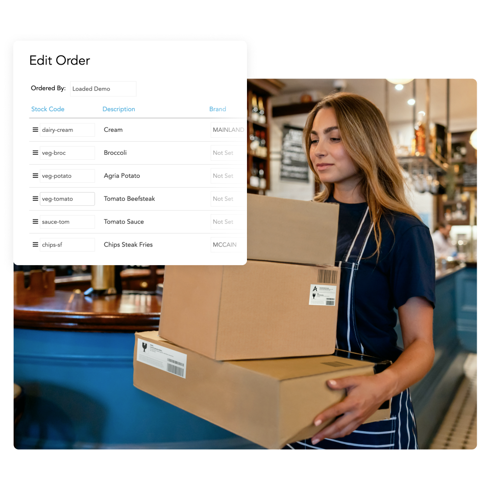 Woman in apron holding three cardboard boxes inside a store, with an order editing interface showing items like cream, broccoli, and fries.