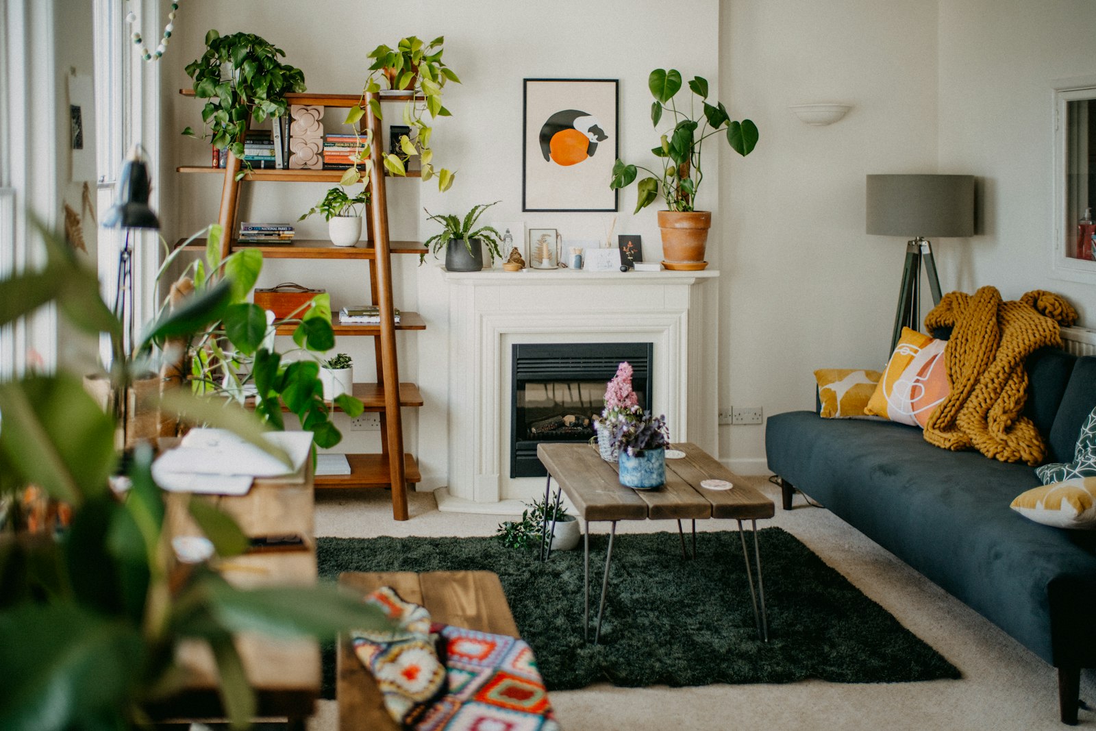 A living room filled with furniture and a fireplace