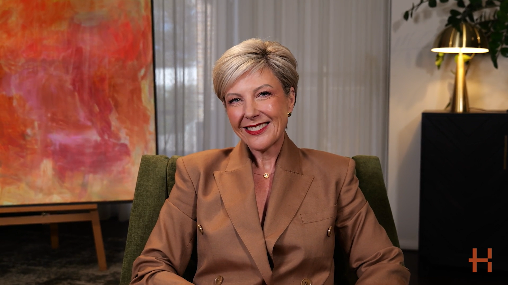 Video thumbnail of Nicole Moody wearing a professional brown jacket