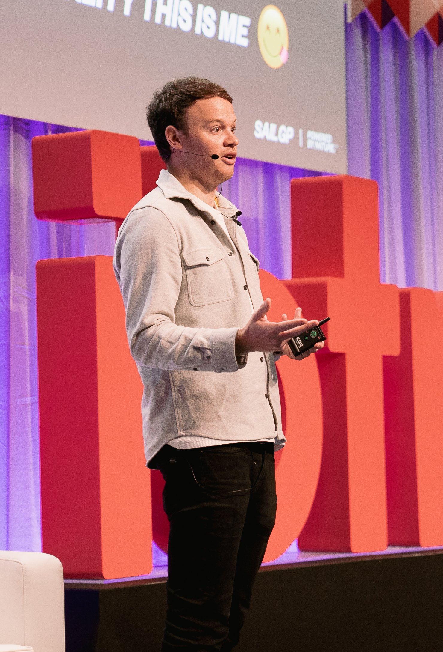 Jake Pryszlak speaking on stage