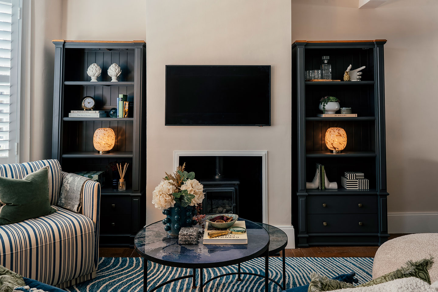 Elegant living room with designer furnishings and Smart TV
