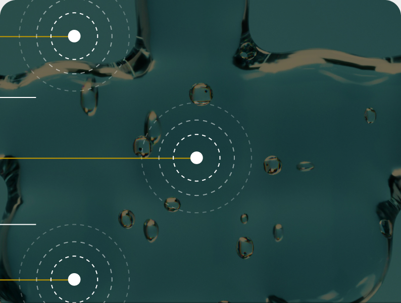 Water droplets on a dark surface with concentric measurement markers