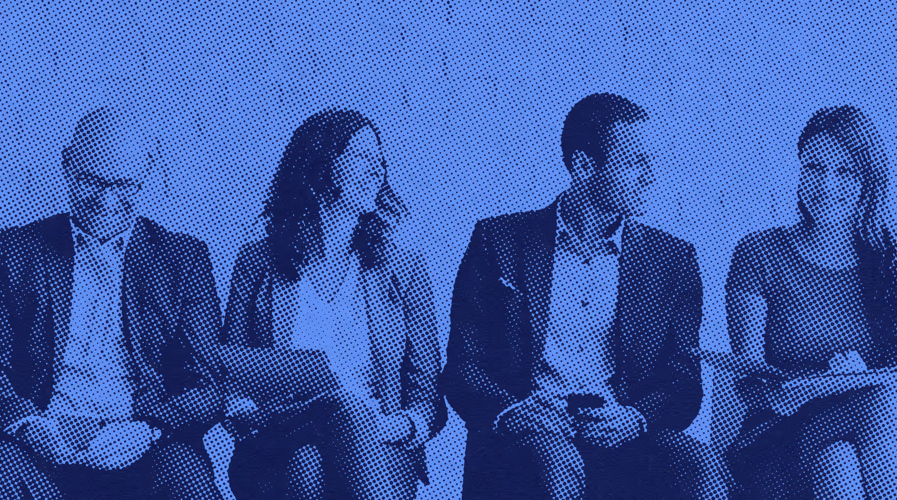 A group of business professionals in conversation