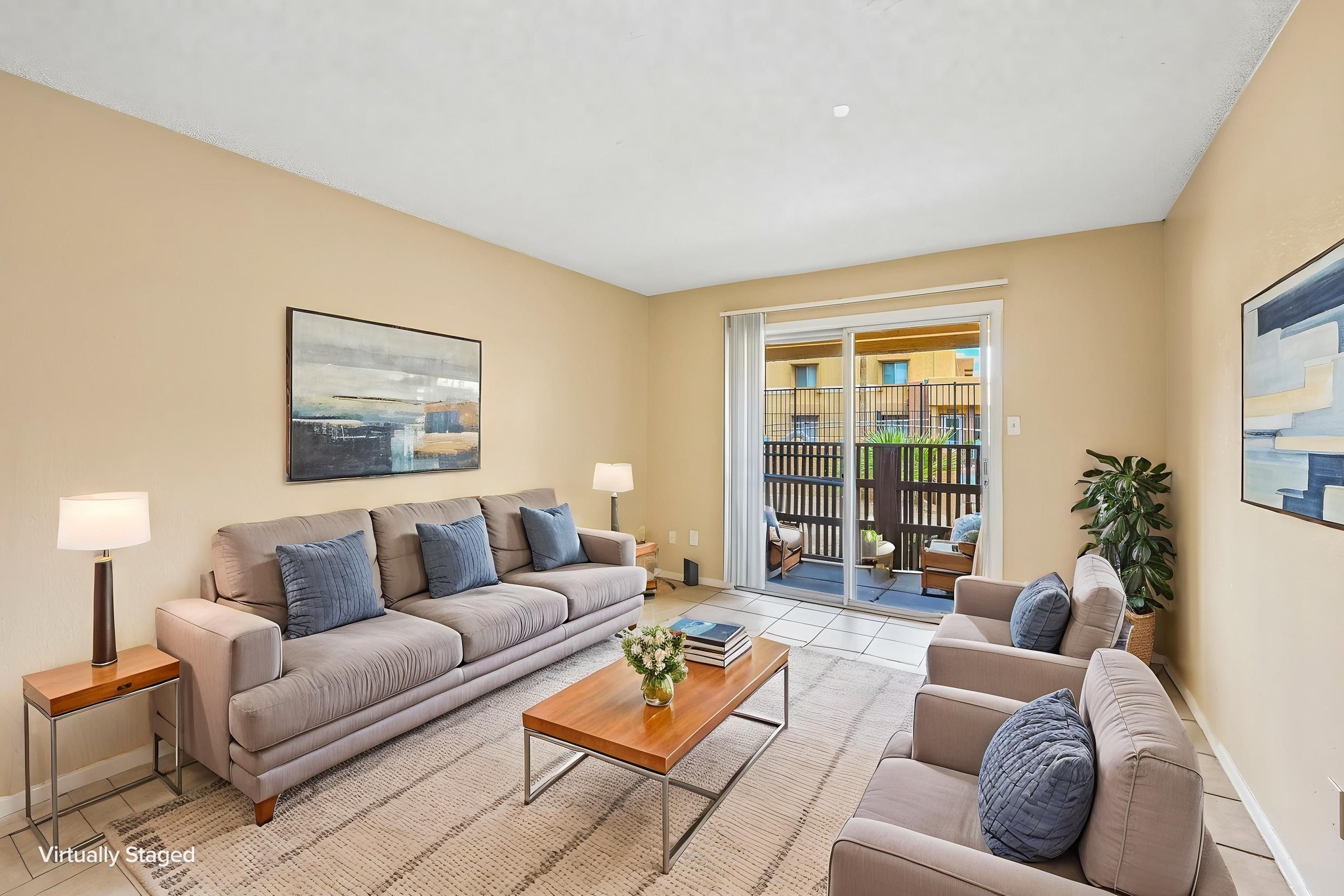 living room with tile, furniture and patio