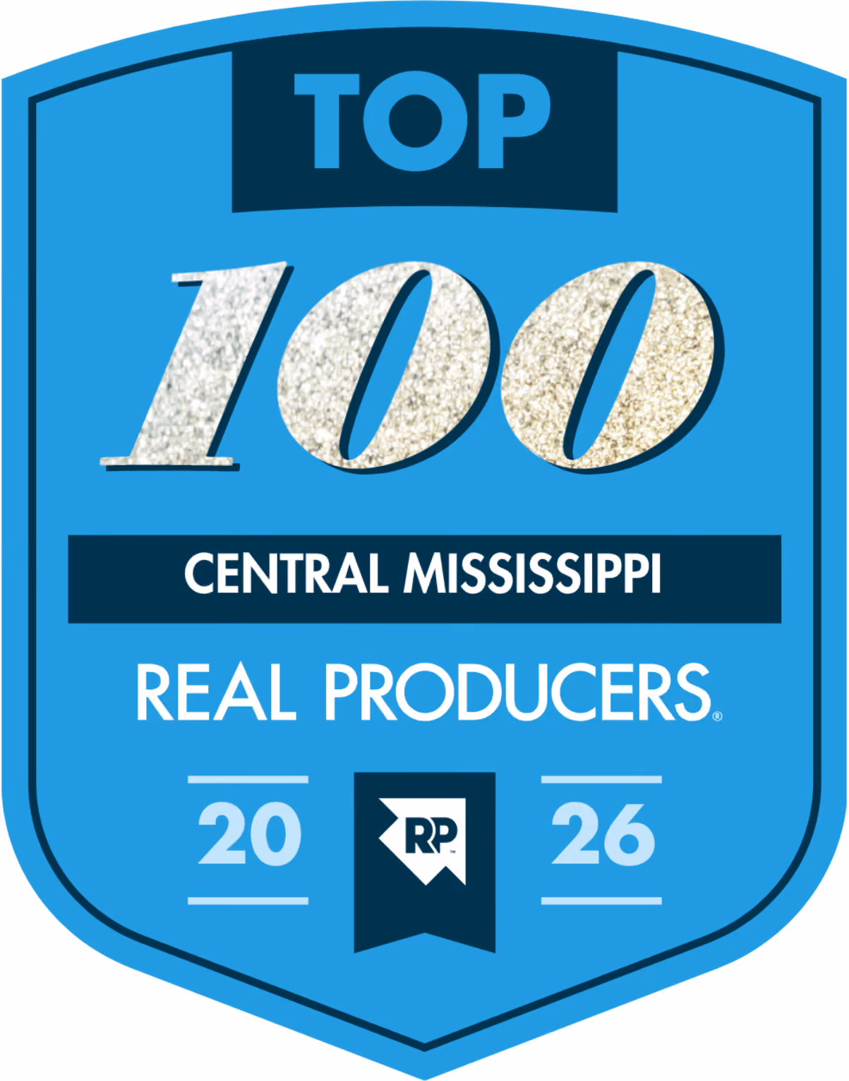 Blue shield-shaped badge with text reading 'Top 100 Central Mississippi Real Producers 2026' and a small 'RP' logo in the center bottom.