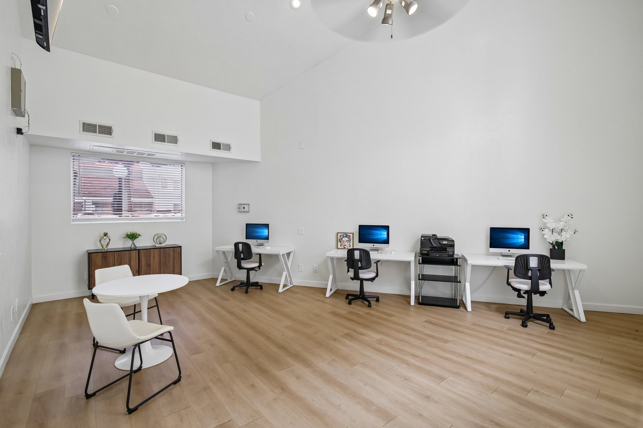 Business center with mac computer and printer